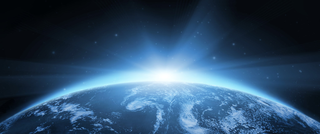 Planet earth with sunrise in the space